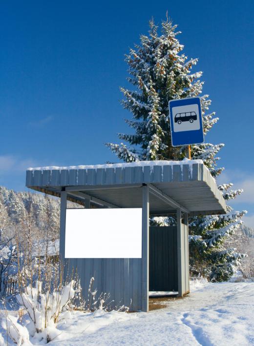 Bus shelters provide an enclosed waiting area for people preparing to ride the bus.