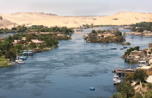 The first barges were used to transport goods, including the blocks that were used to build the Pyramids of Giza, down the Nile River.