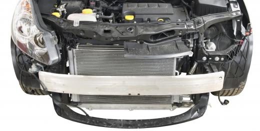 A grille is a device found on a vehicle that sits directly in front of the radiator.