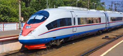 Commuter trains are often parked in a train shed when not in use.