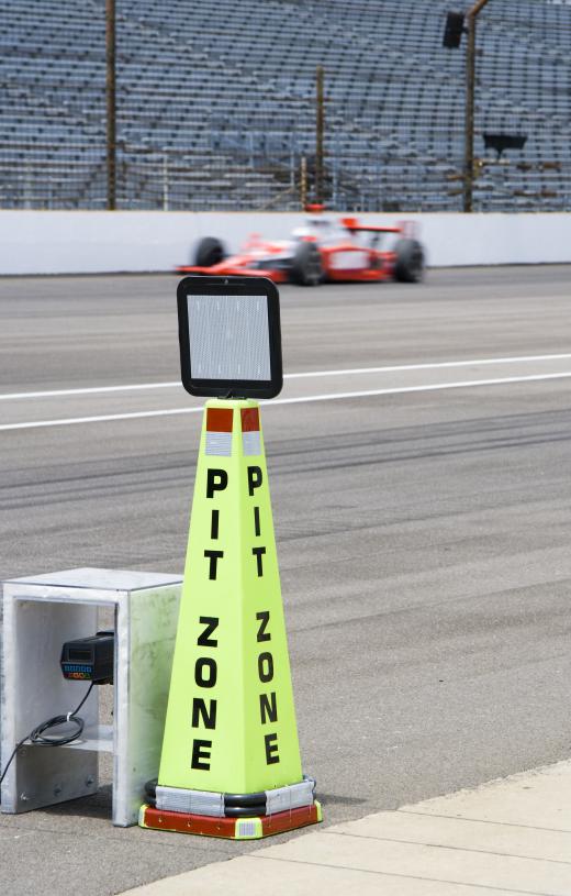 Some racing steering wheels include a radio that allows the racecar driver to communicate with the pit crew.