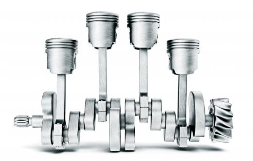 Piston rods, or connecting rods, are the vertical rods connected to the cylinder-shaped pistons at top and the crankshaft, running horizontally, at the bottom.