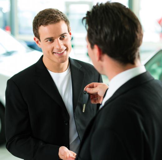 A person buying a car.