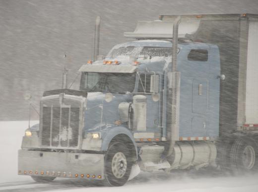 Stopping a tractor trailer can be difficult in inclement weather conditions.