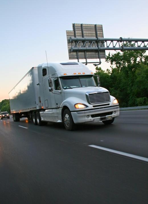 Tractors trailers feature a truck at the front end and a trailer that can be hitched to the truck at the back.