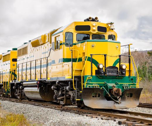 On a diesel-electric locomotive, a diesel engine provides power to an electric traction motor that turns the unit's wheels.